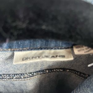 Denim jacket with cute detailing at the shoulders, large buttons